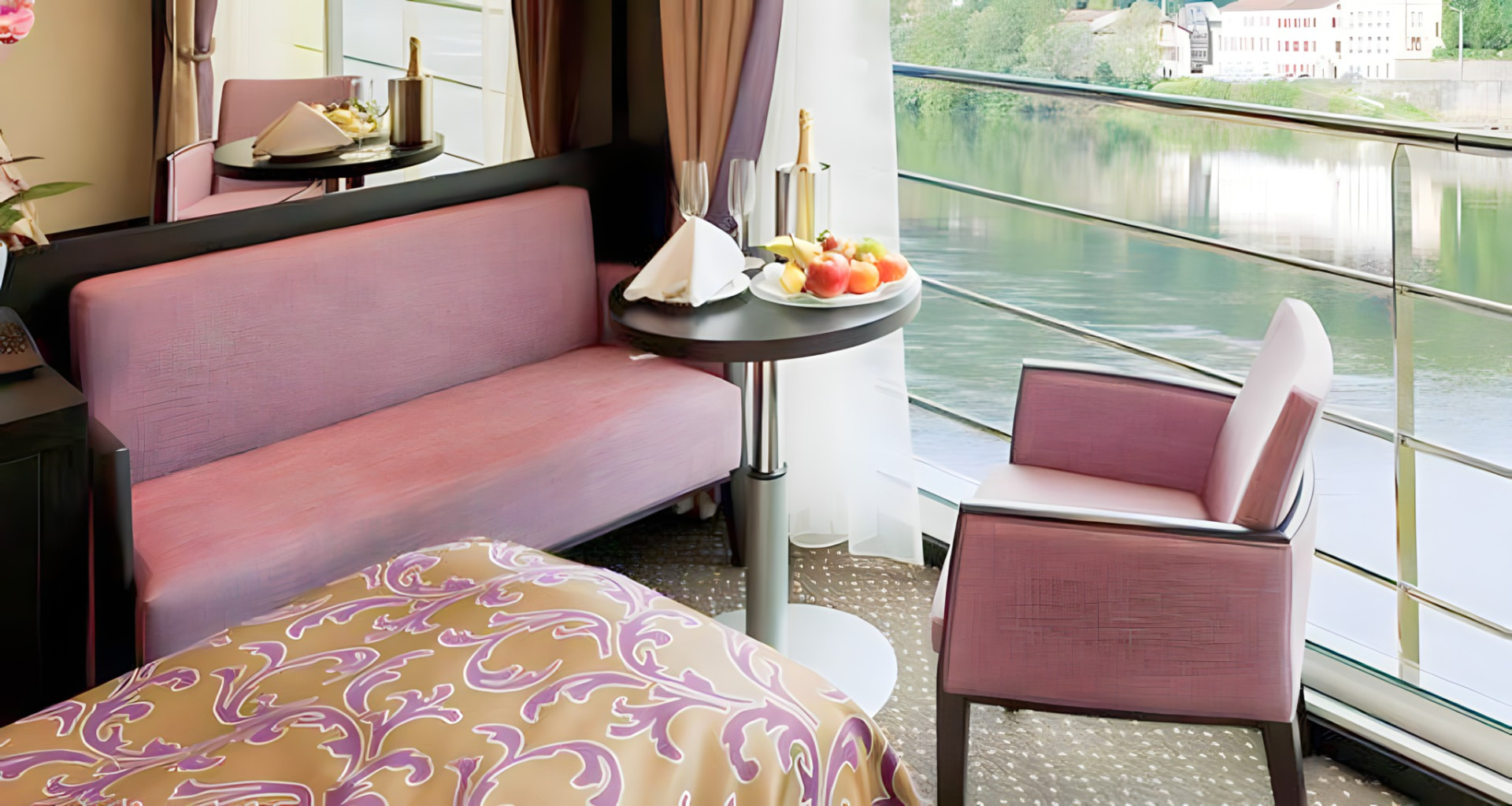 A private nook with champagne and fruit by the window