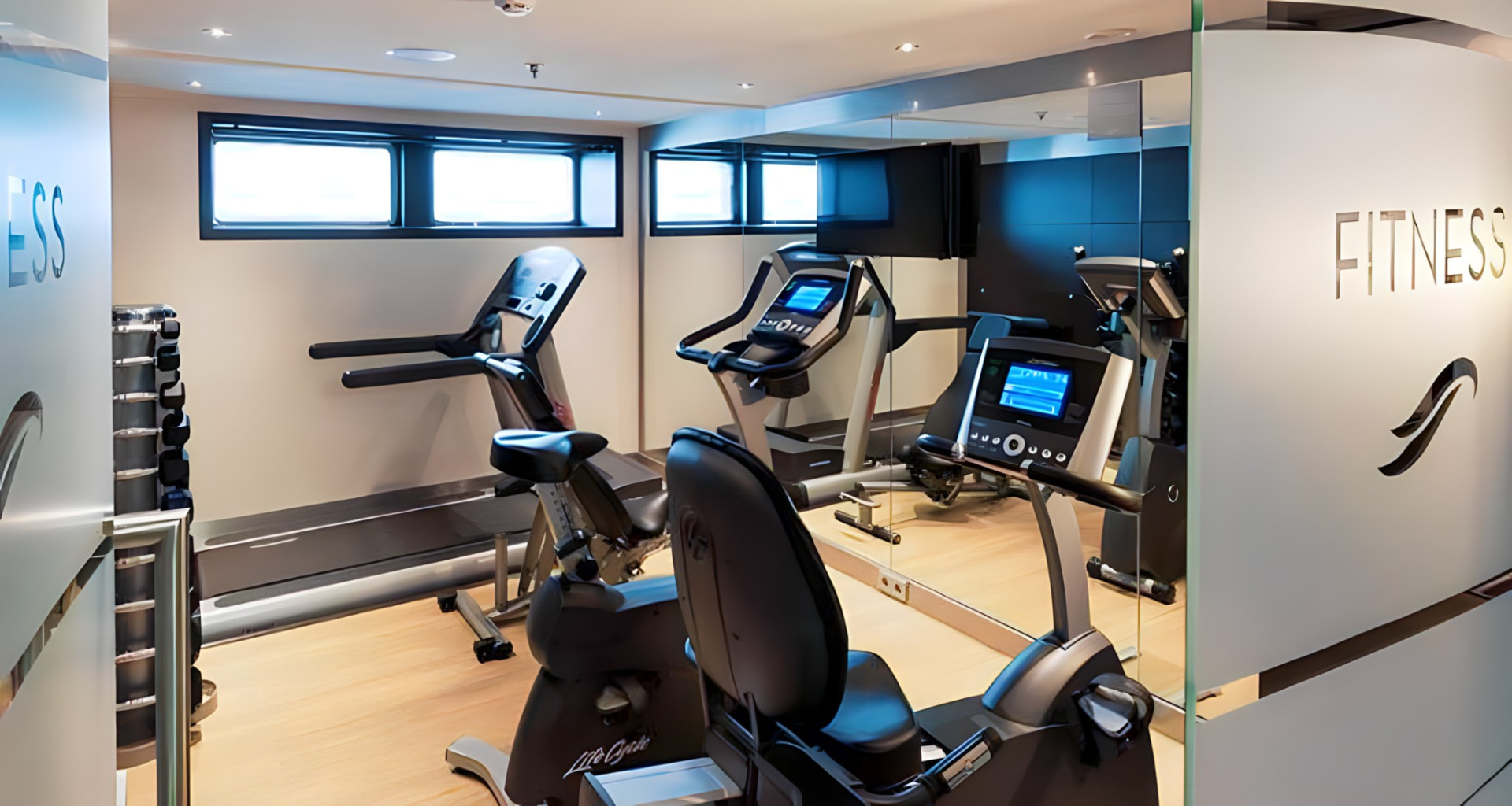 The ship's fitness room with river views
