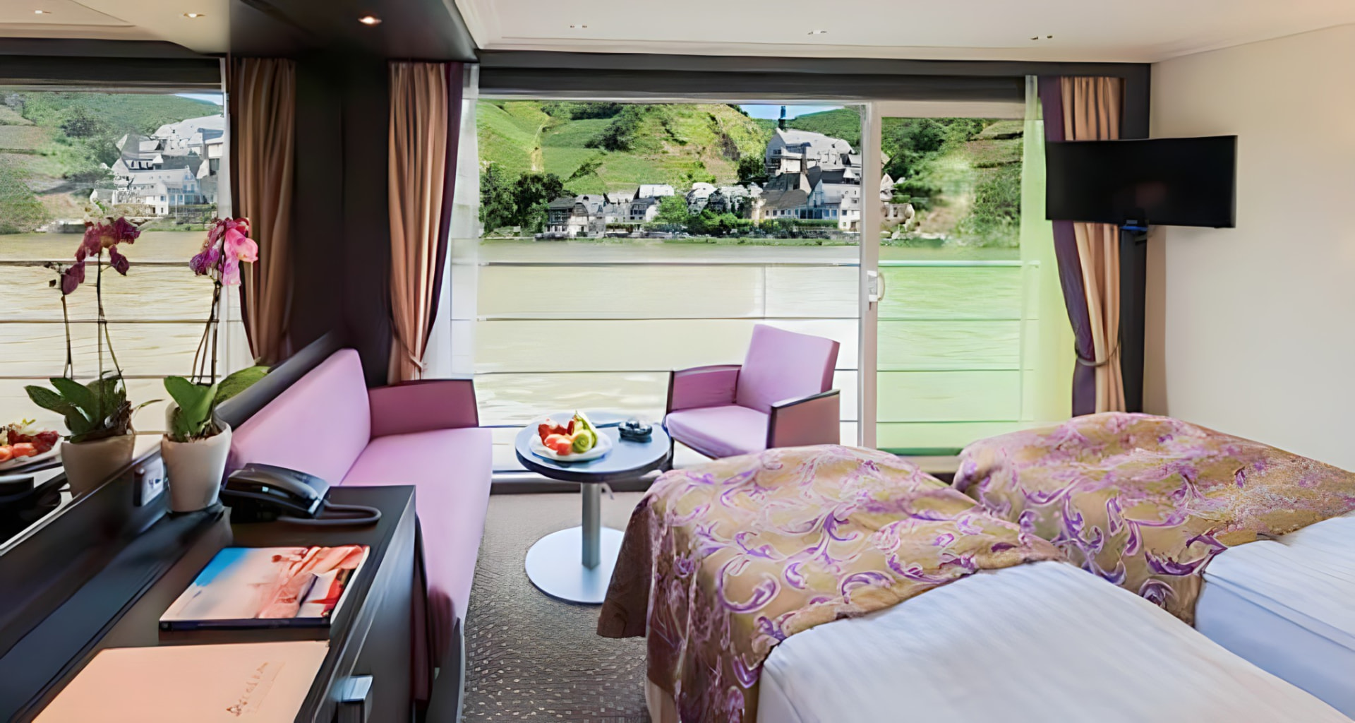 A stateroom with panoramic river views